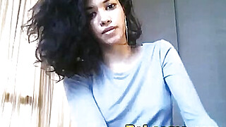 Sexy Ebony teen with curly hair teasing Porn Video