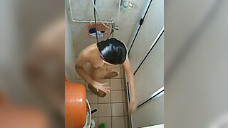 Spying on SG Cousin showering Porn Video