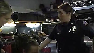 Busty cops get banged by black mechanic in garage Porn Video