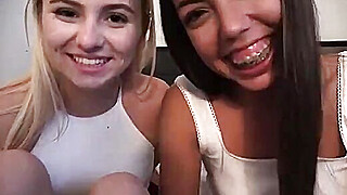 Petite teen cuties give a double blowjob before threesome fucking Porn Video