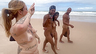 Friends go to the nude beach to give it to the hot guys. Porn Video